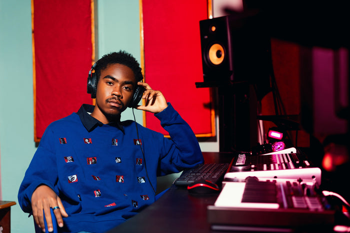 Focused artist recording in studio turning music into a compounding revenue stream