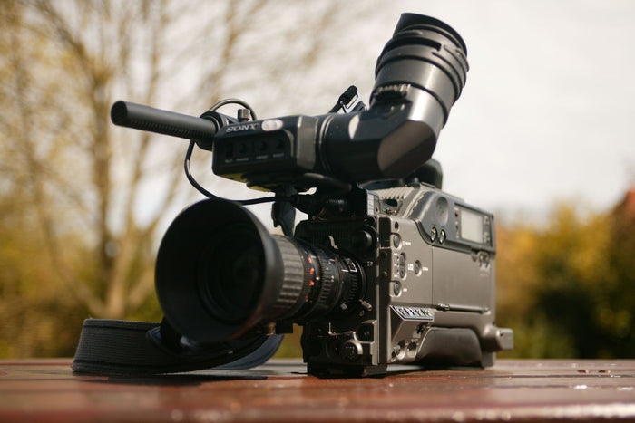 Film production camera on set for music placement