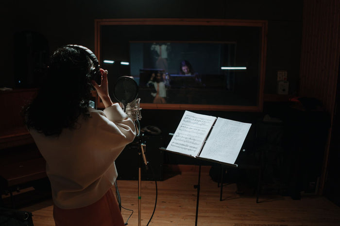 Artist finishing a song in a home recording studio