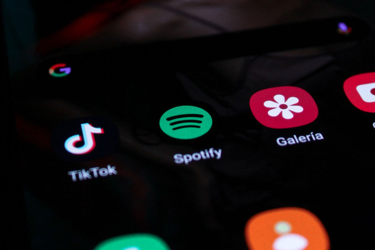 Listener streaming music on Spotify from a phone