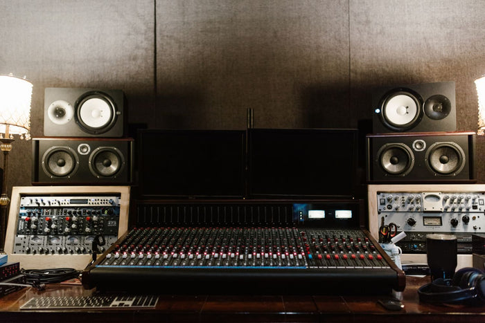 Audio engineer mastering a song for streaming platforms